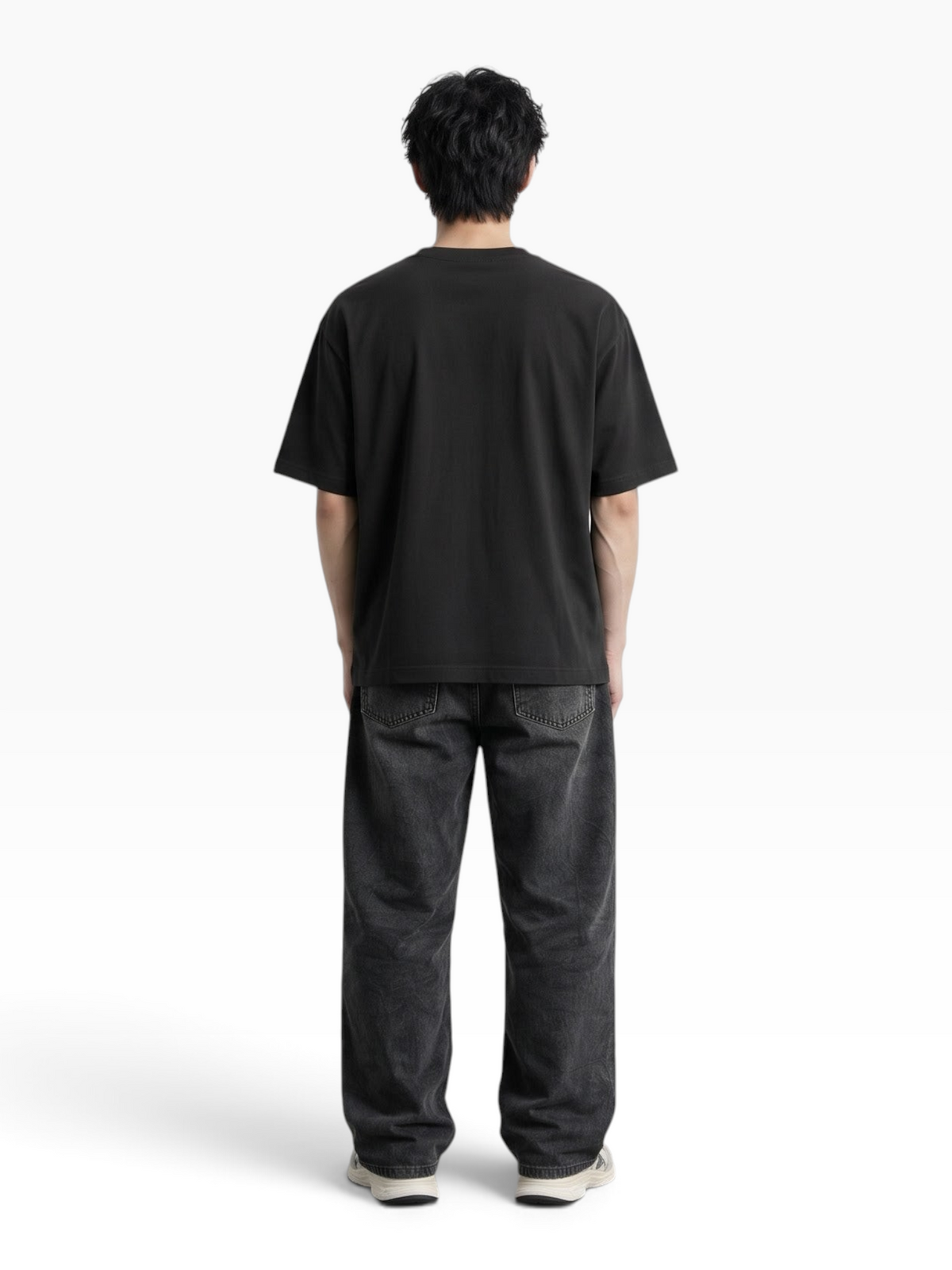 Back view of a man wearing an E7 black heavyweight cotton oversized t-shirt with a slouchy fit and drop shoulders.
