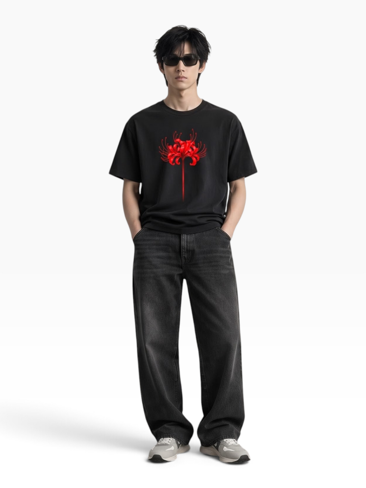 E7 unisex oversized black cotton t-shirt with a red spider lily graphic, worn by a model in dark jeans and sneakers.