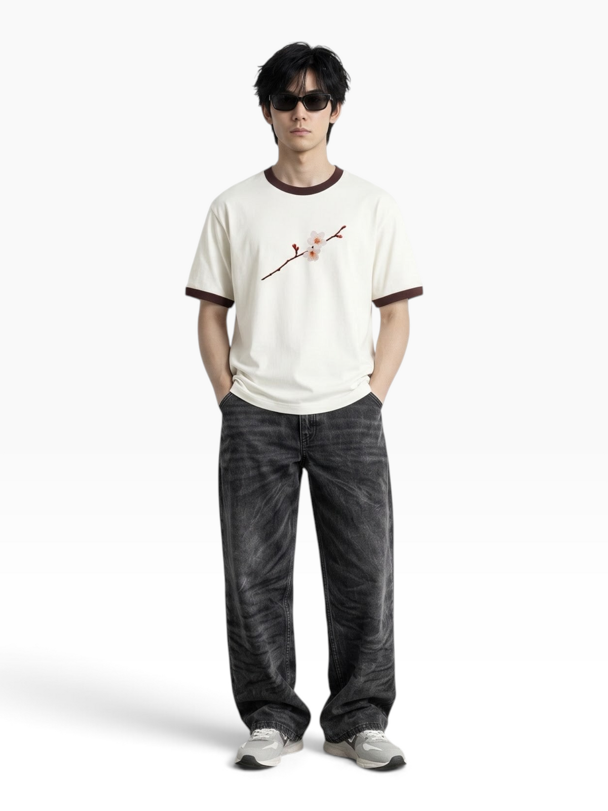 E7 unisex ringer t-shirt in cream with brown ribbed neck and sleeves, featuring a floral graphic, worn by a model.