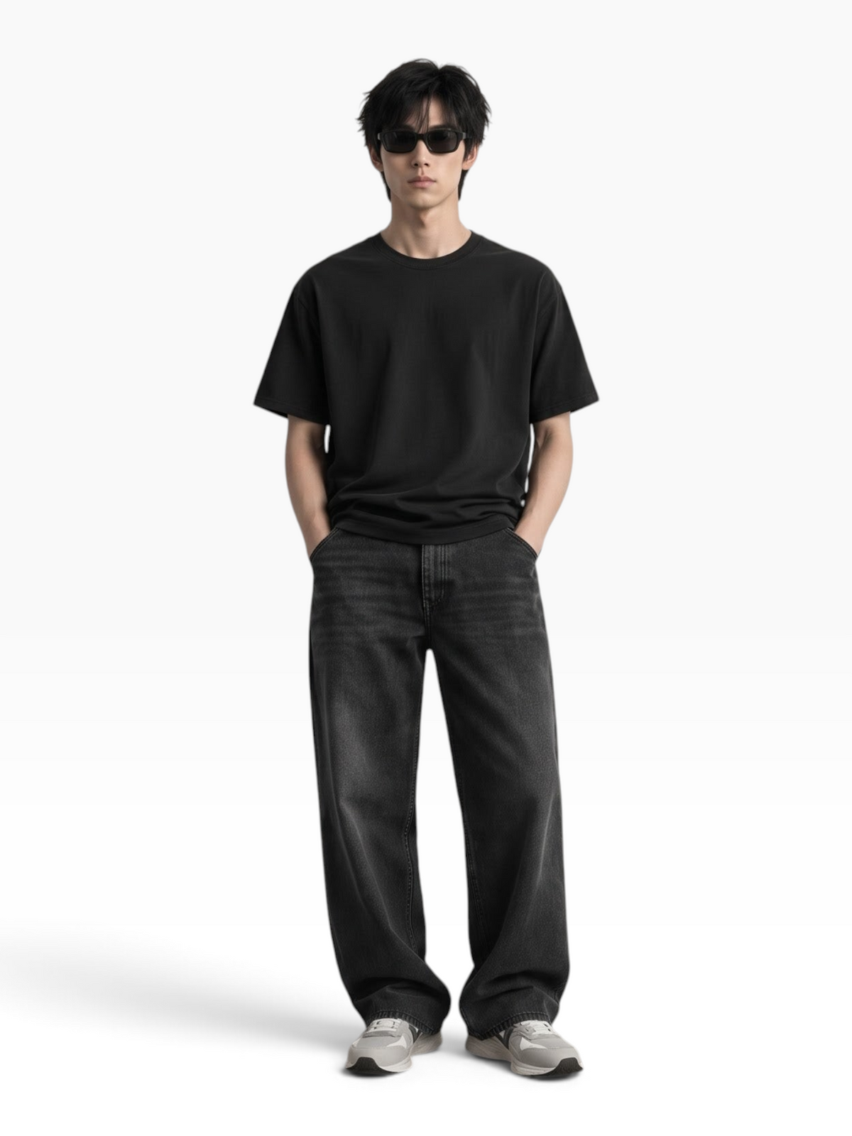 E7 unisex oversized black heavyweight cotton t-shirt worn by a man with sunglasses and dark jeans