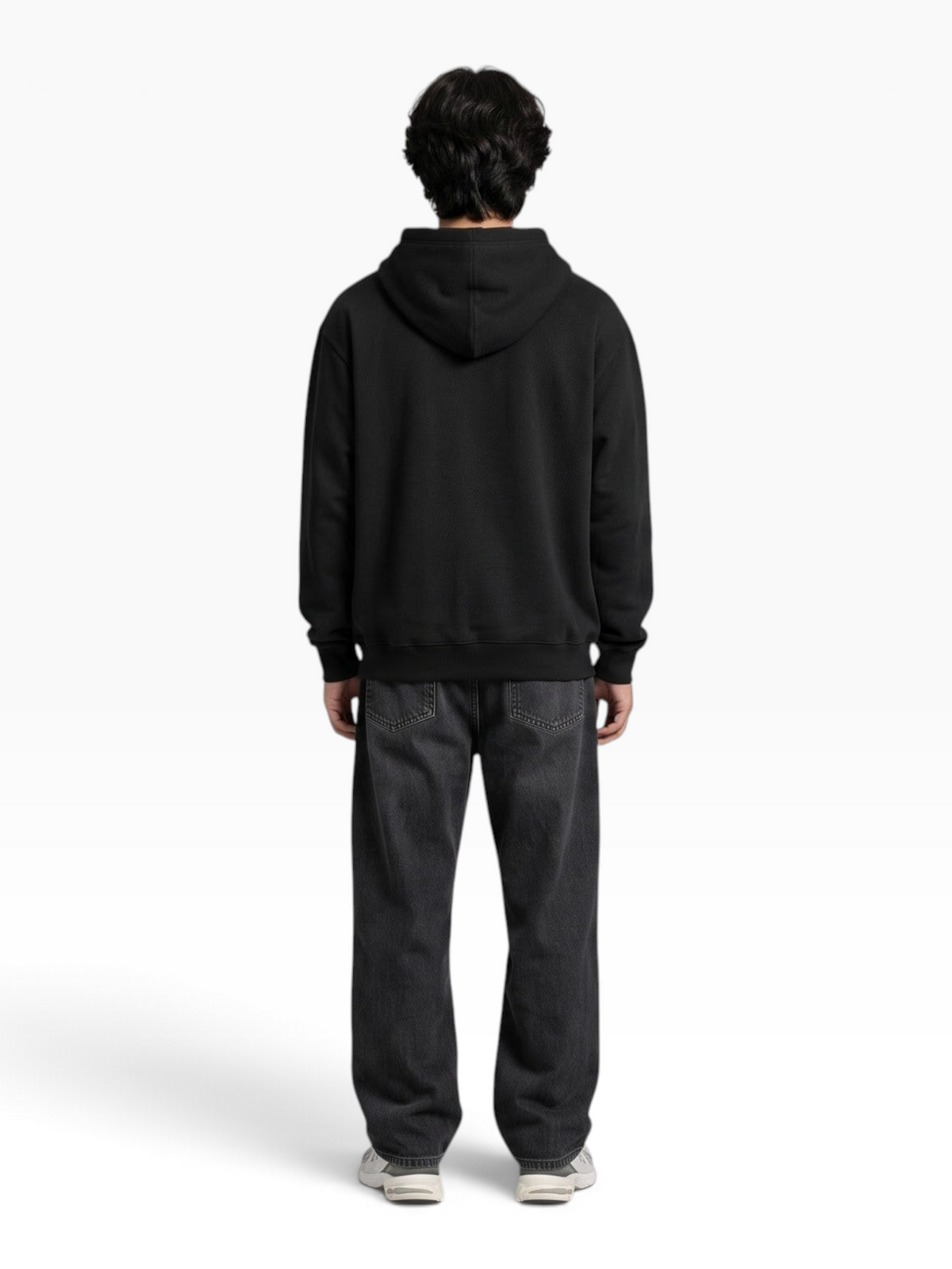 E7 unisex regular fit black cotton blend pullover hoodie worn by a man, back view against a grey background.