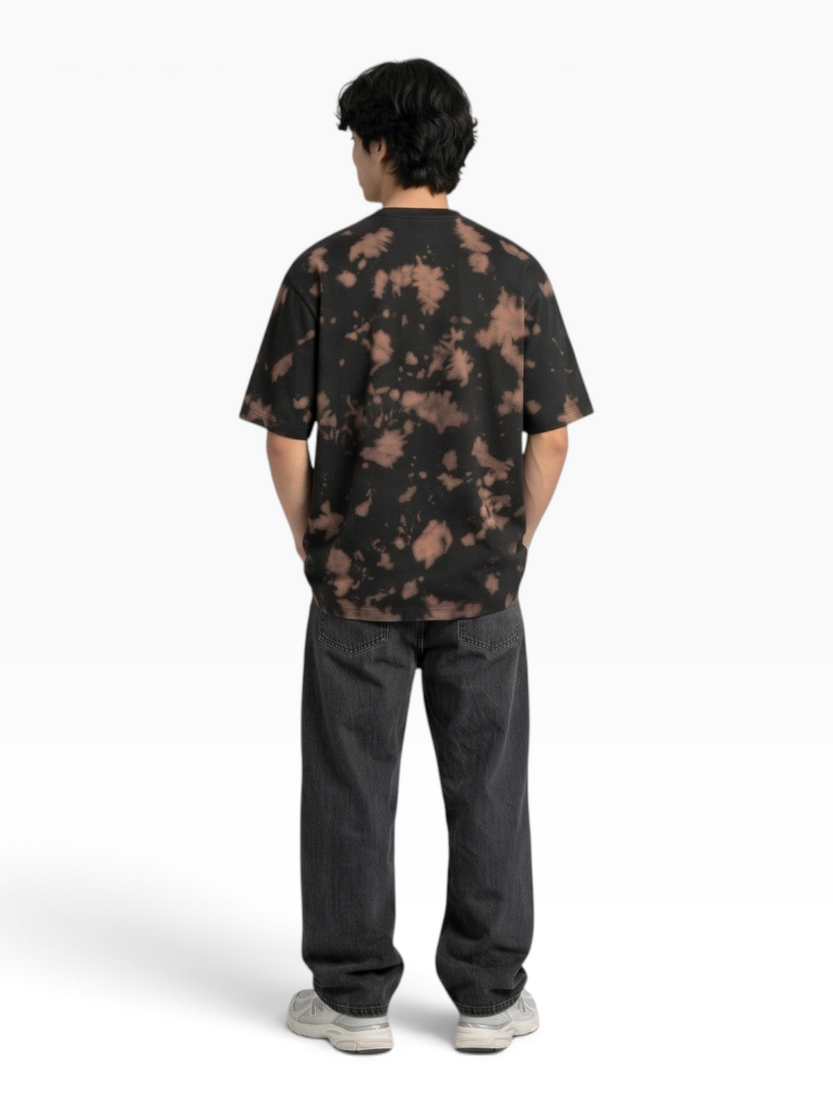 E7 unisex oversized tie-dye t-shirt in black and brown worn by a man from the back view
