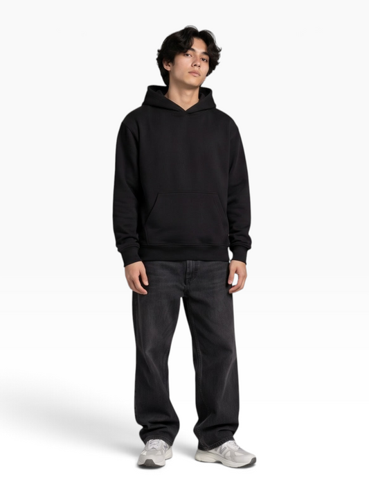 A man wearing an E7 unisex black cotton-blend pullover hoodie with a regular fit and front kangaroo pocket.