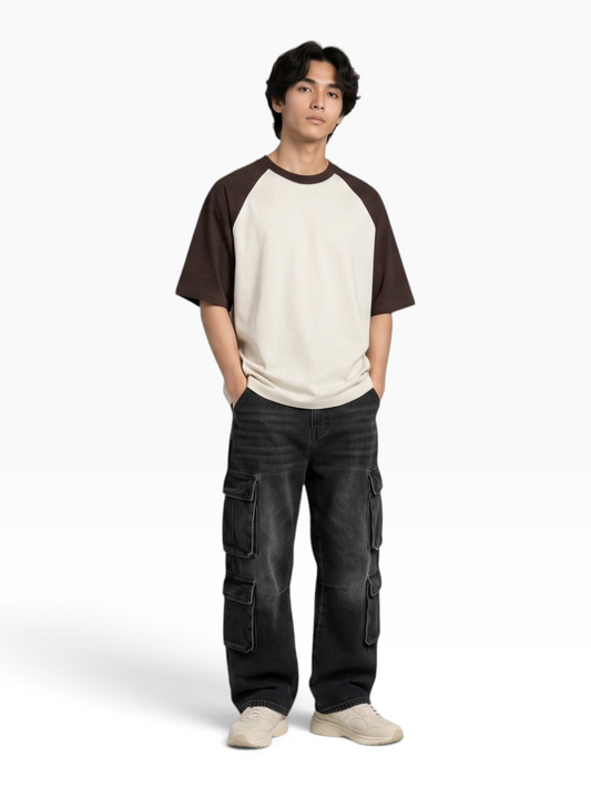E7 unisex oversized raglan t-shirt in cream and brown cotton, worn by a man with black cargo pants